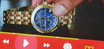 Tissot gold watch chronograph model by actor Mohan Kumar